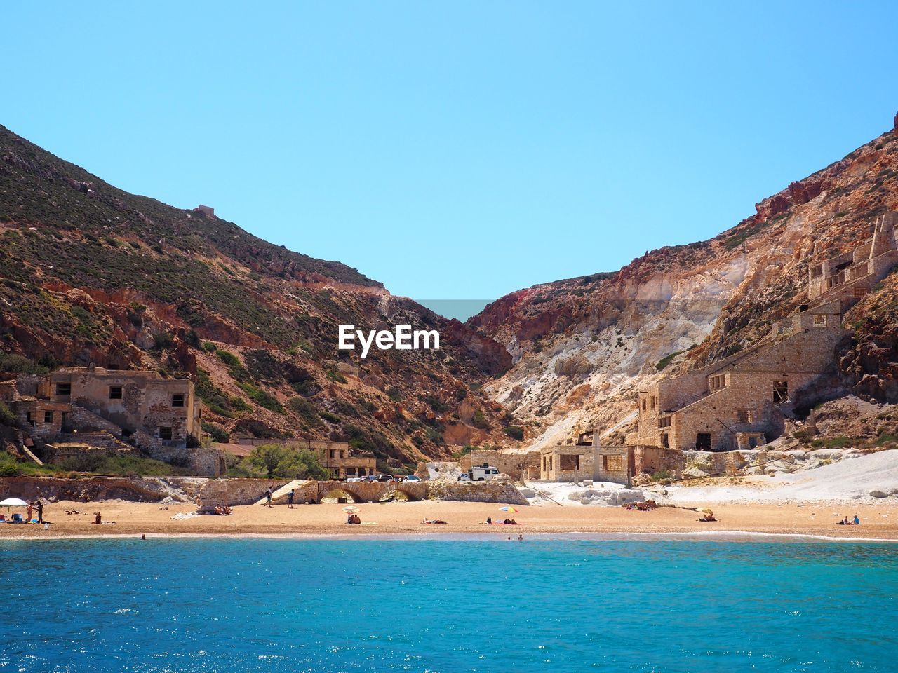 Scenic view of mountain against blue sky