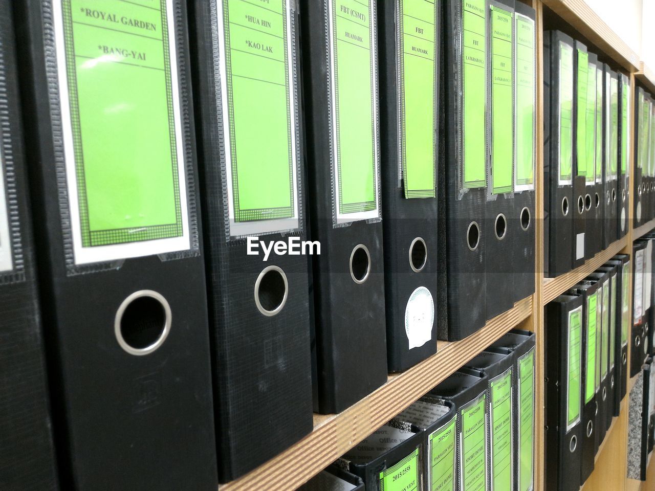 Close-up of files in rack