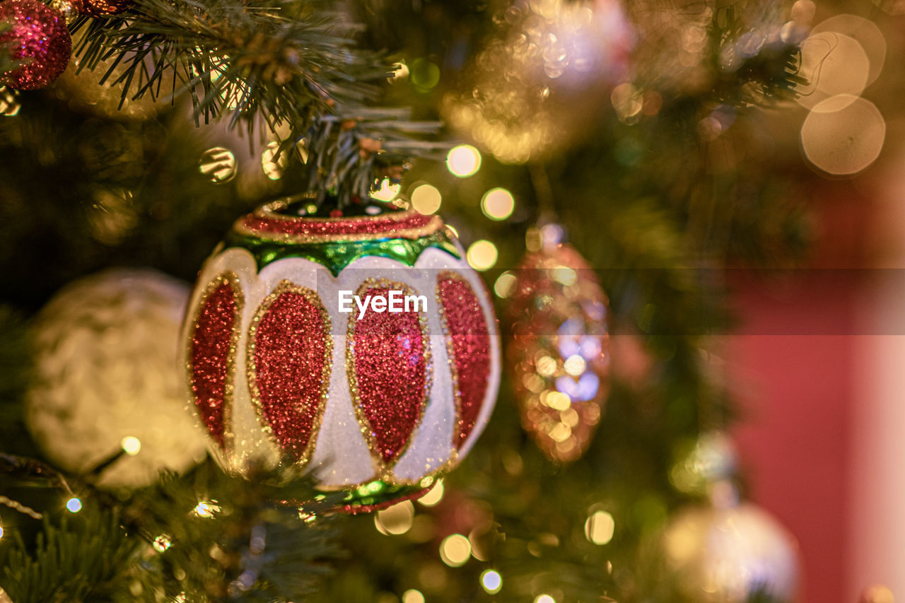 close-up of christmas decorations hanging on tree