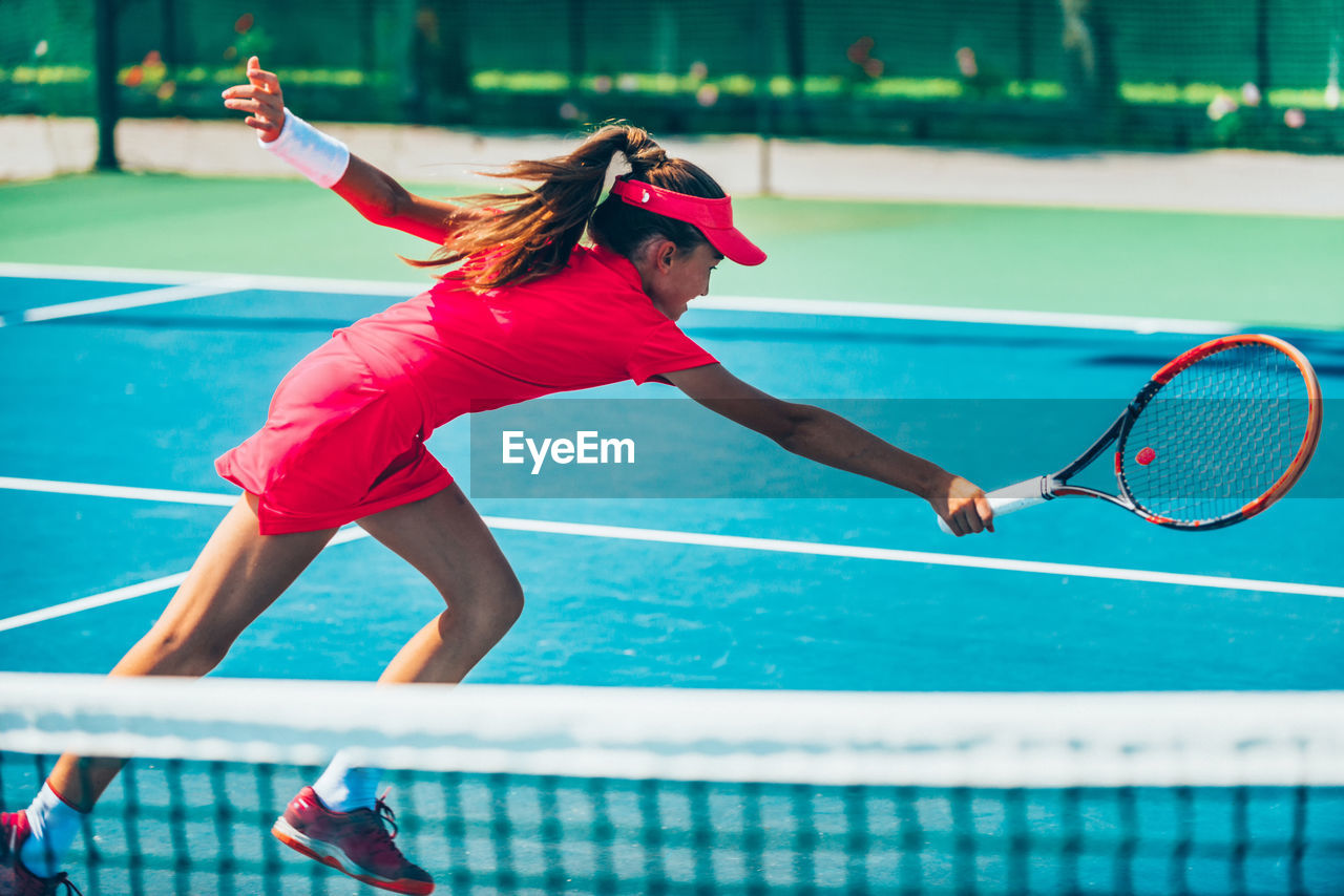 Girl playing tennis