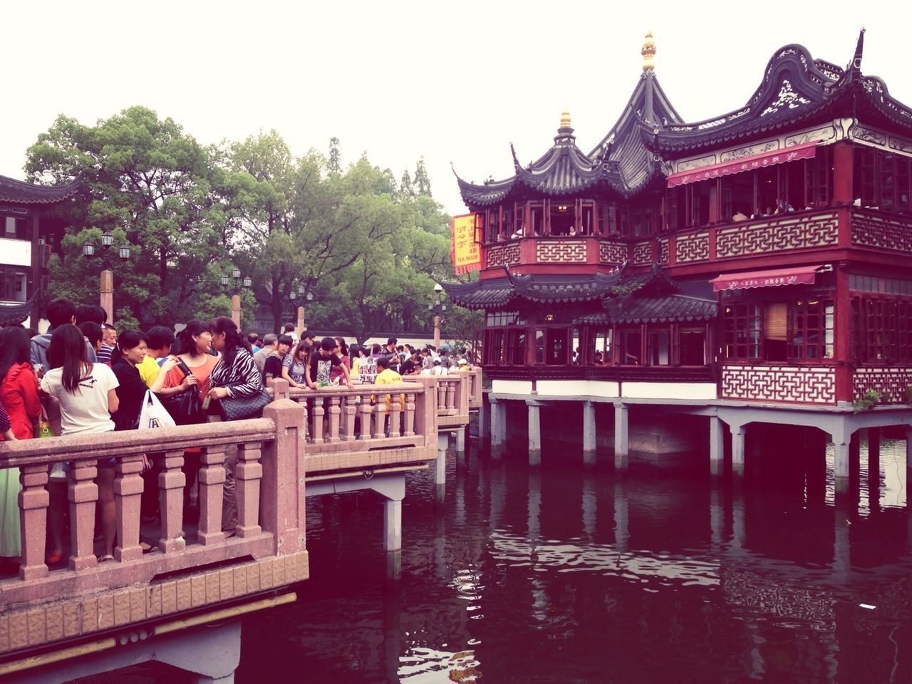 View of traditional building on water