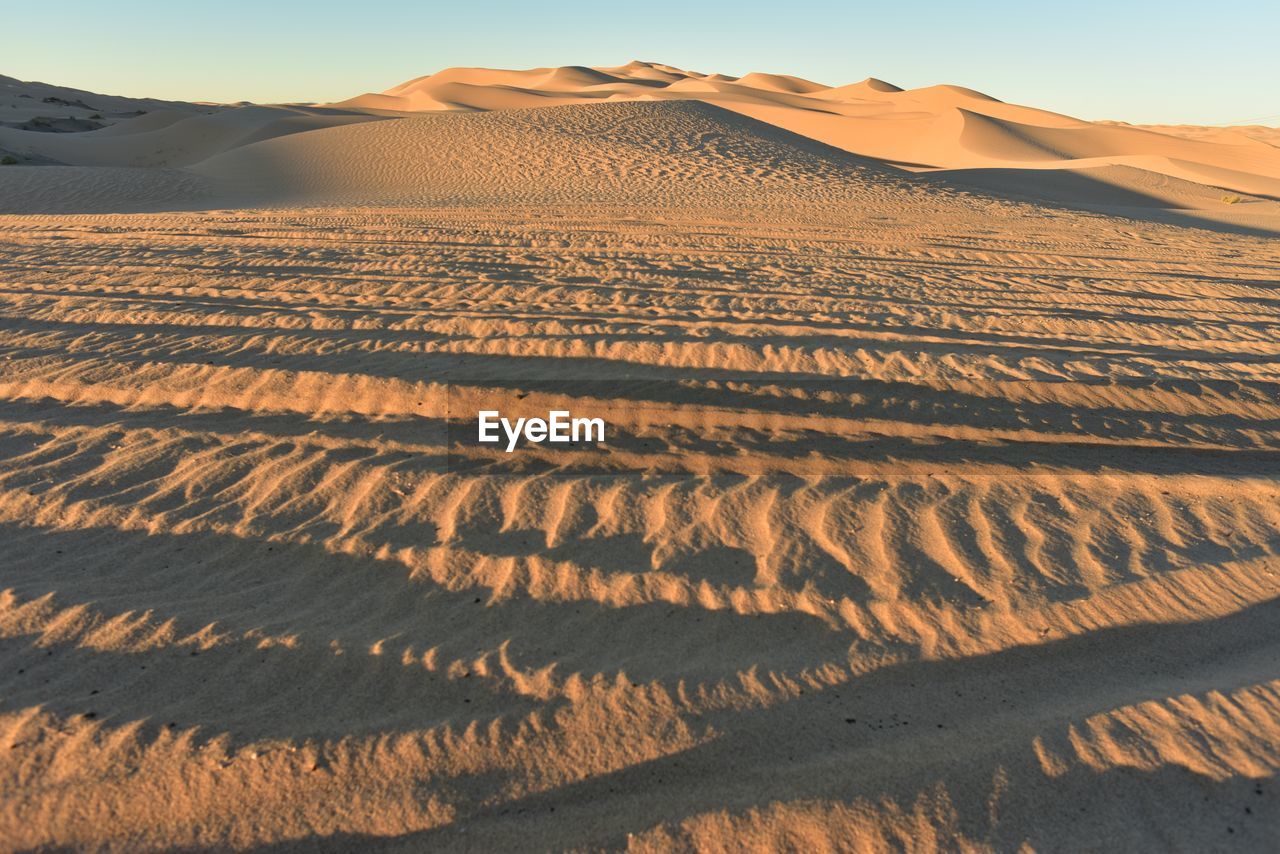 Scenic view of desert against sky