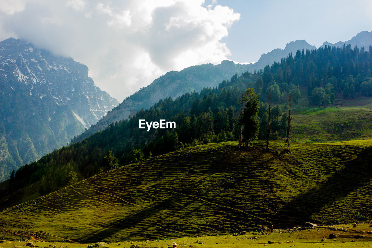 Scenic view of mountains against sky