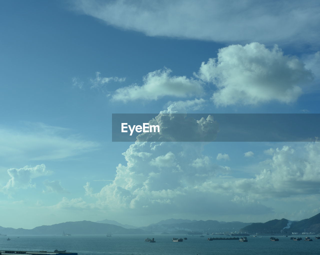 Scenic view of sea against blue sky