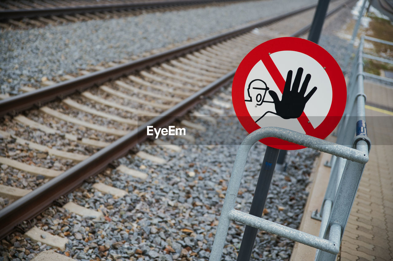 Close up of a danger sign on a railway station
