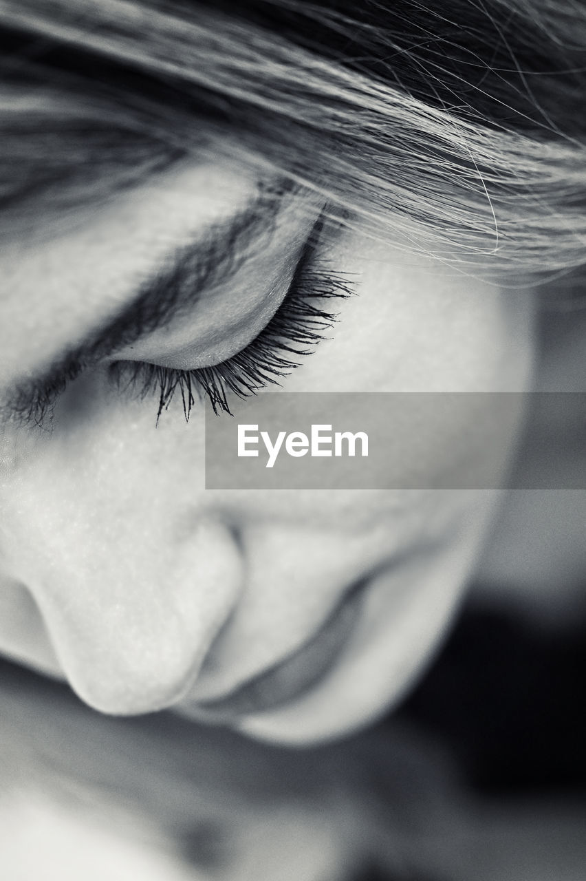 one person, human face, white, black and white, close-up, monochrome photography, human eye, monochrome, black, adult, portrait, women, young adult, portrait photography, human head, person, eyes closed, eye, sadness, indoors, headshot, looking, eyelash, selective focus, emotion, skin