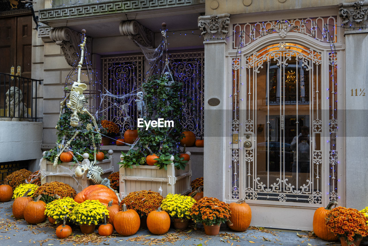 architecture, food and drink, celebration, food, decoration, building exterior, no people, built structure, plant, pumpkin, holiday, nature, building, tradition, flower, entrance, door, vegetable, outdoors, fruit, house, day, residential district, floristry, healthy eating, autumn