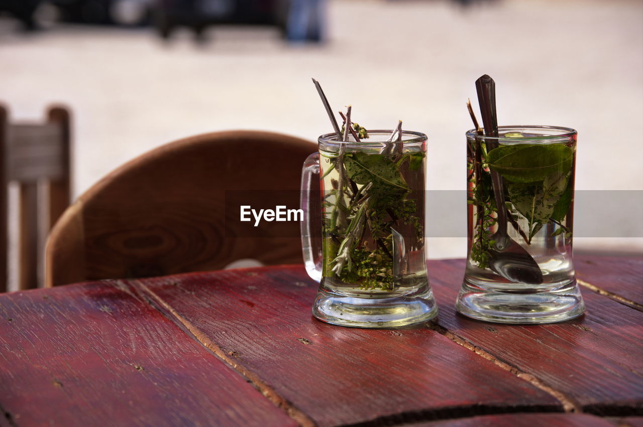 food and drink, drink, table, wood, refreshment, drinking glass, glass, alcoholic beverage, food, household equipment, no people, alcohol, herb, freshness, focus on foreground, nature, healthy eating, indoors