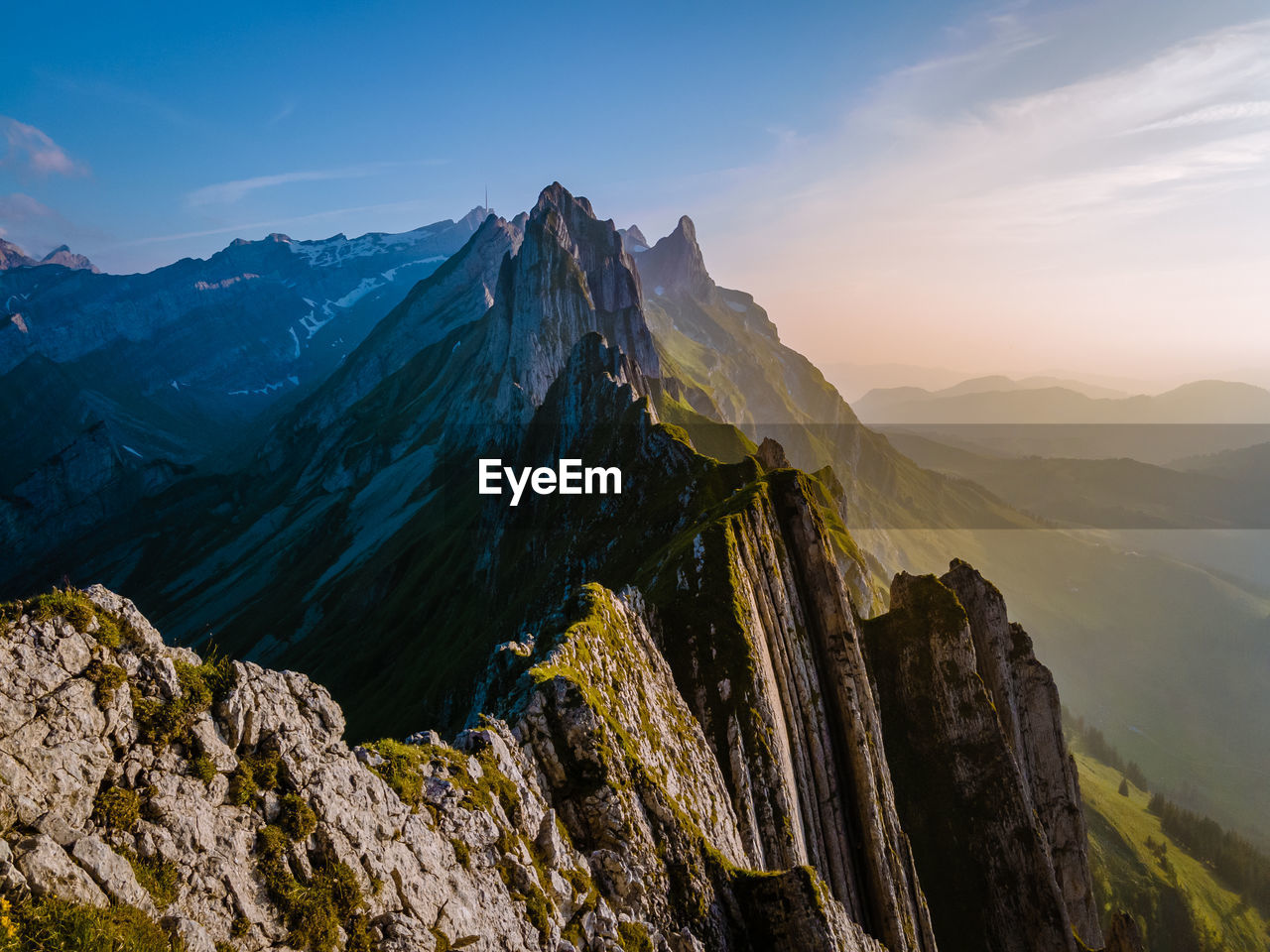 PANORAMIC VIEW OF ROCKY MOUNTAINS AGAINST SKY