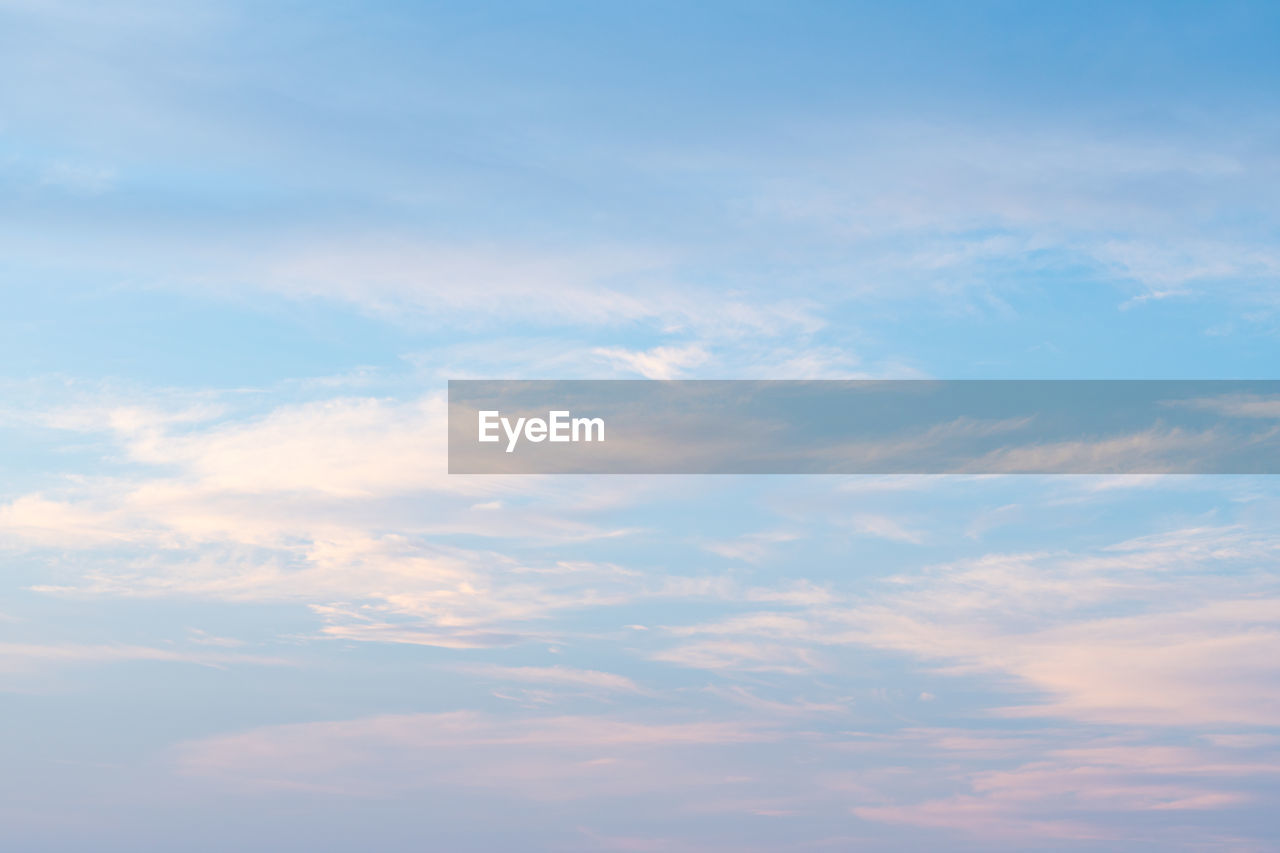 LOW ANGLE VIEW OF CLOUDS IN BLUE SKY