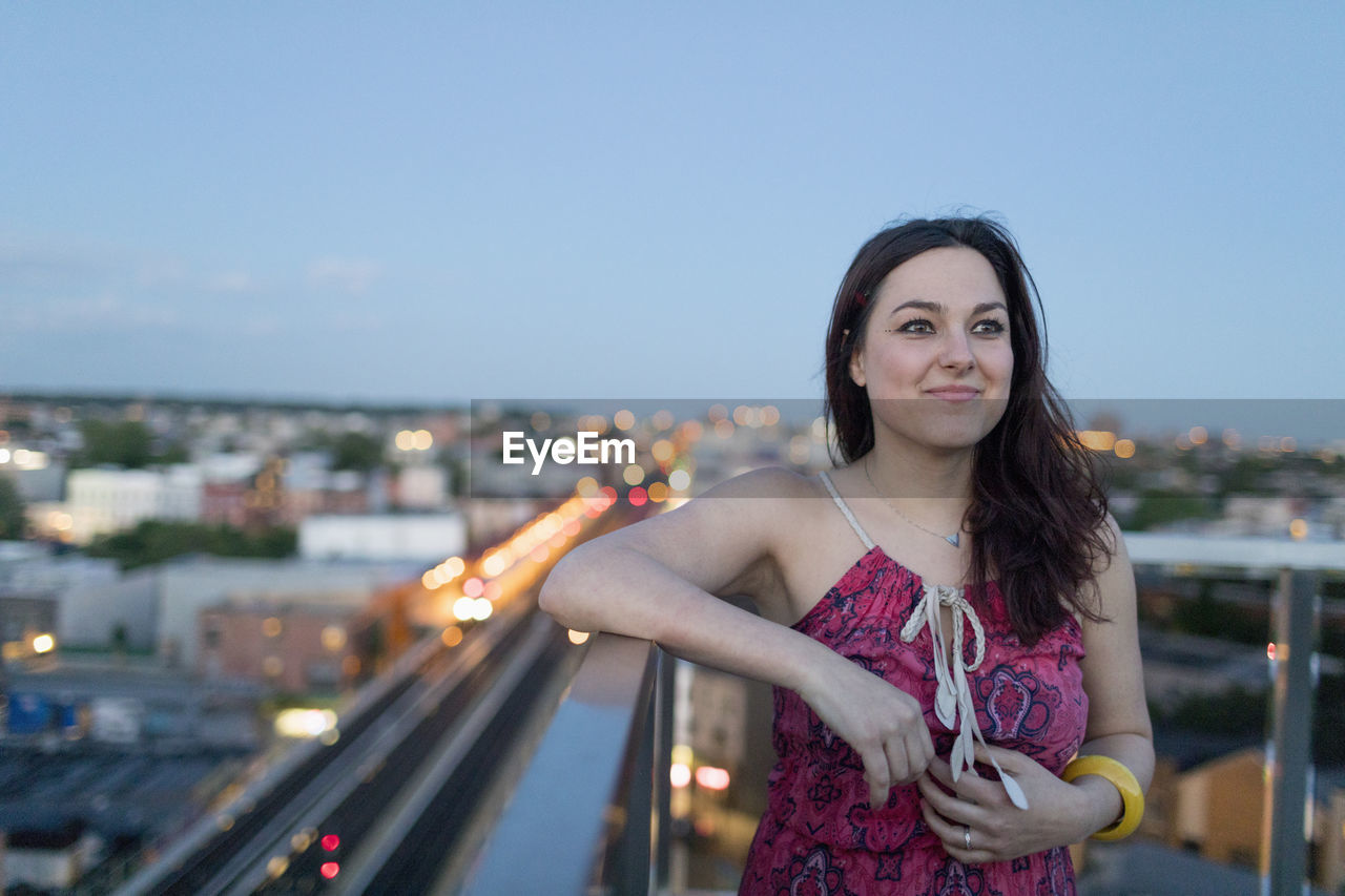 Young woman on a rooftop