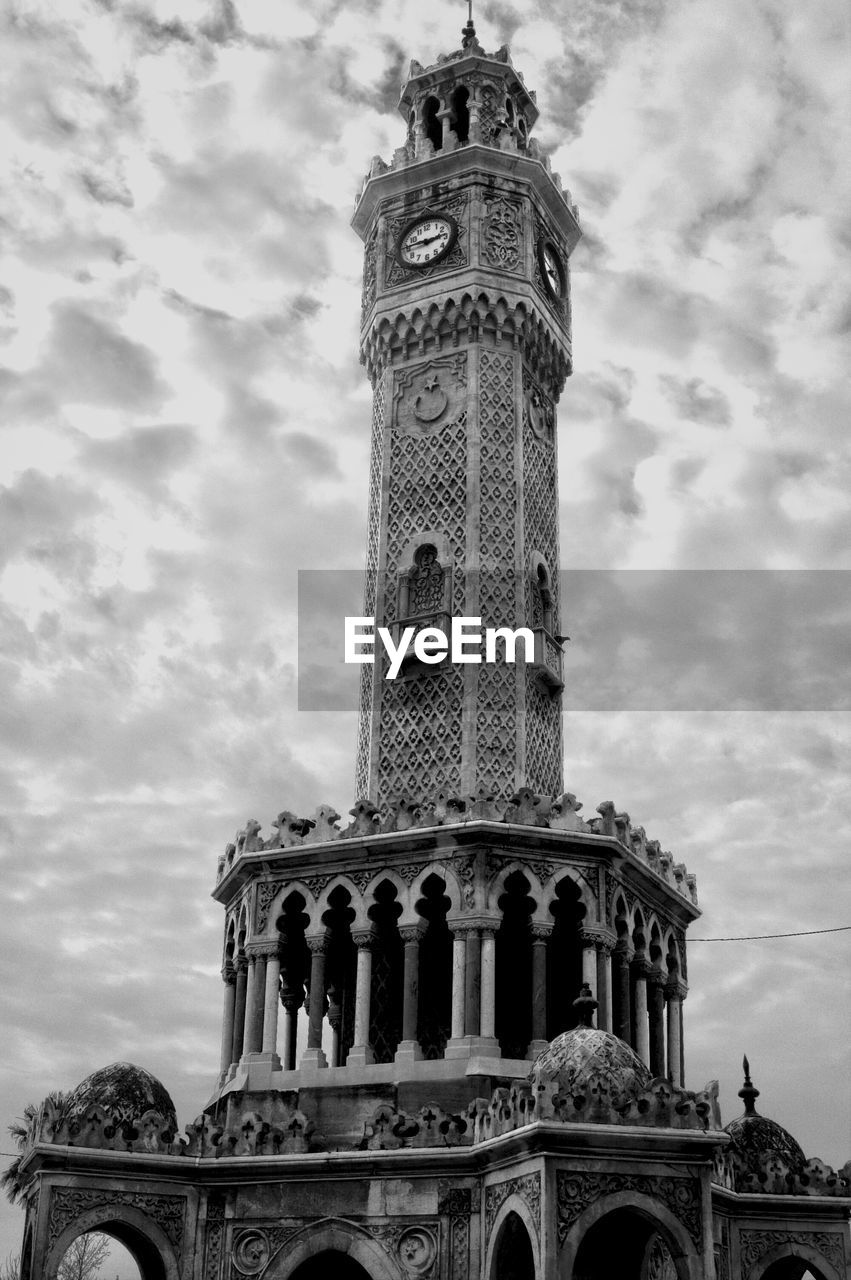 Low angle view of izmir clock tower against sky