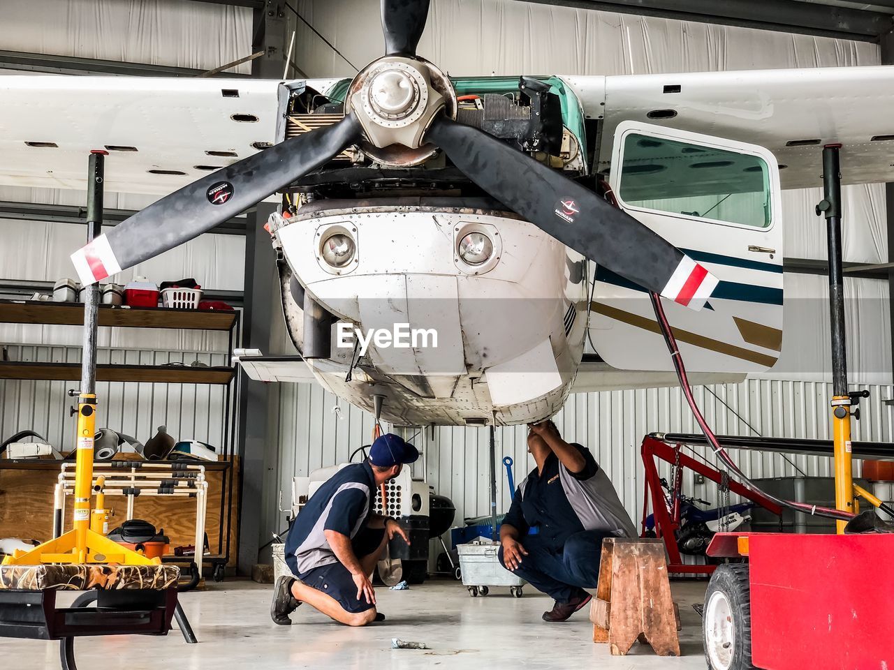 PEOPLE WORKING IN AIRPLANE