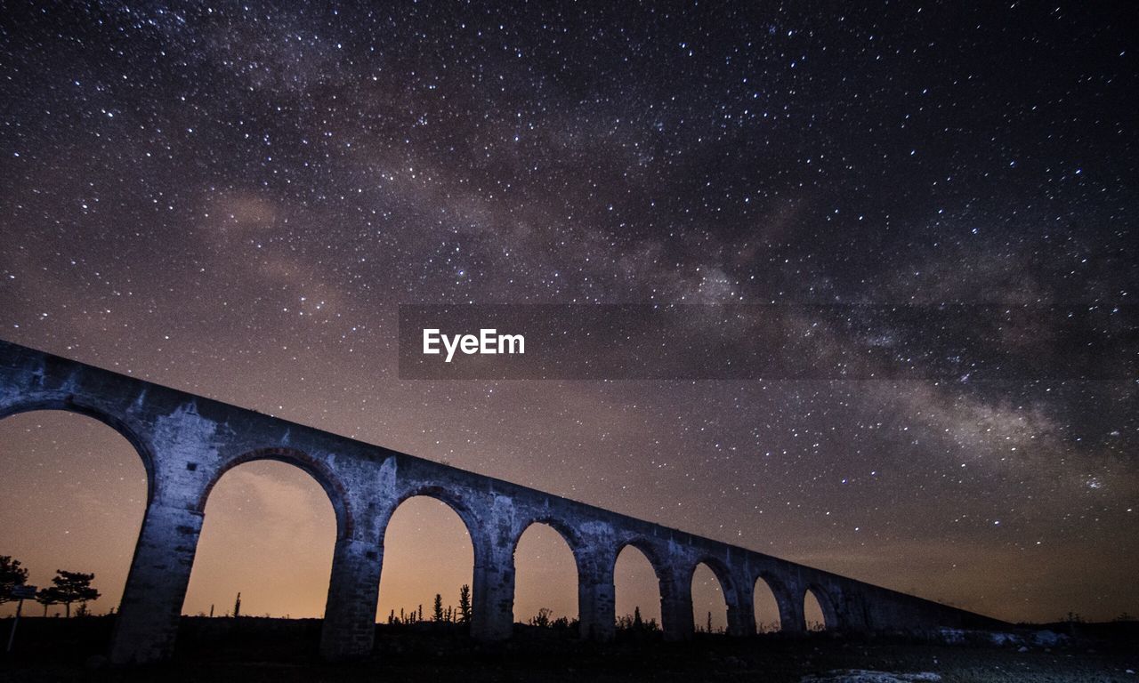 Scenic view of star field against sky at night