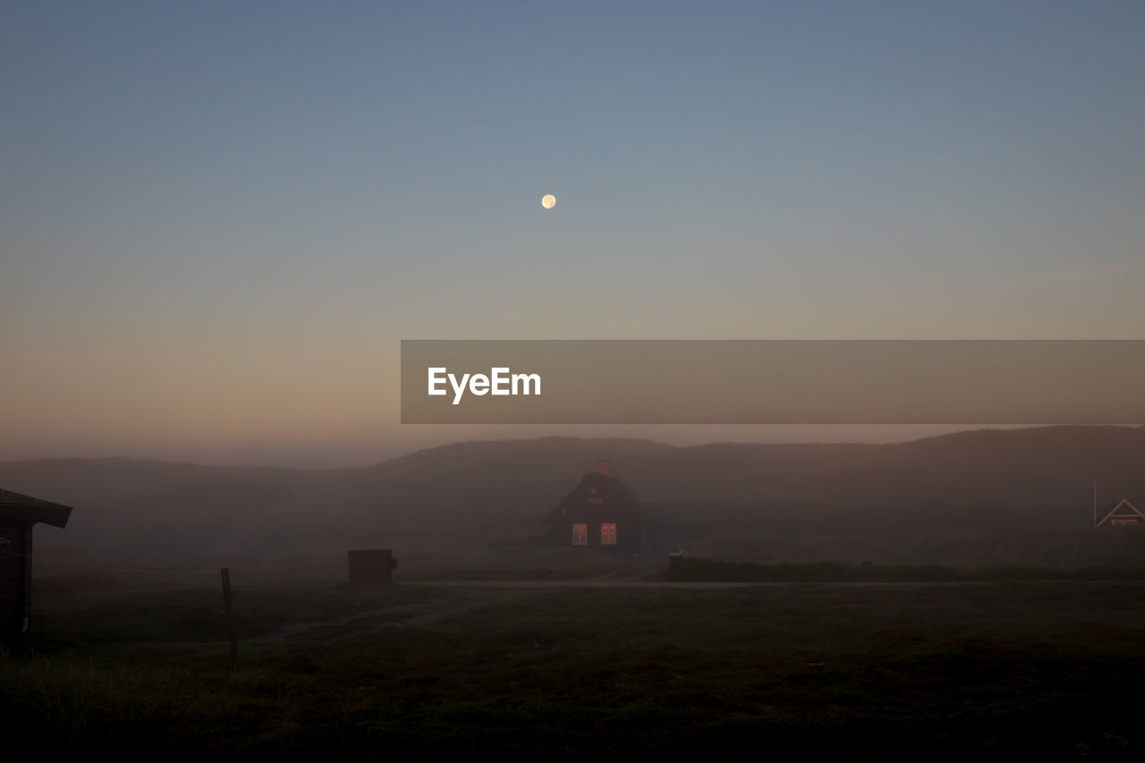 Scenic view of landscape against sky during sunset