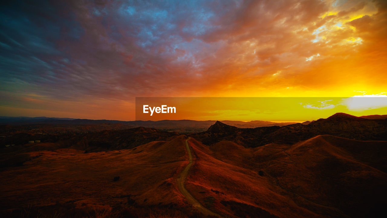 SCENIC VIEW OF LANDSCAPE DURING SUNSET