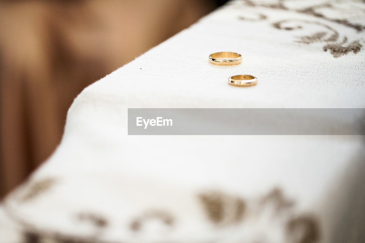 Close-up of rings on table