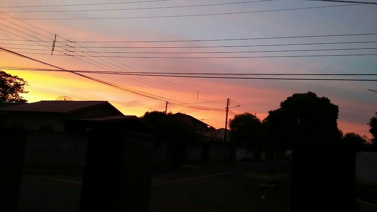 ELECTRICITY PYLONS AT SUNSET