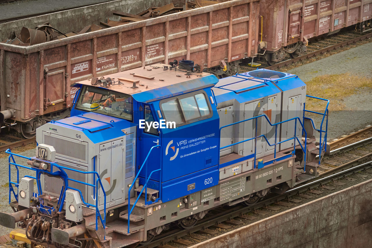 HIGH ANGLE VIEW OF TRAIN ON RAILROAD STATION