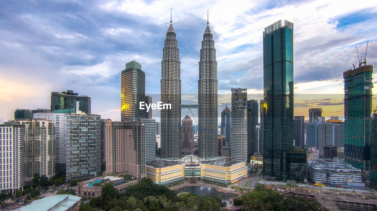 Modern buildings in city against sky