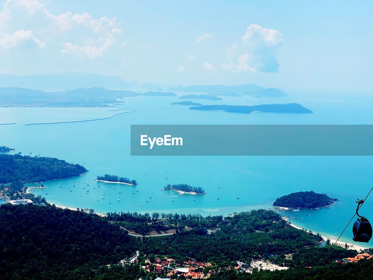 High angle view of bay and sea against sky