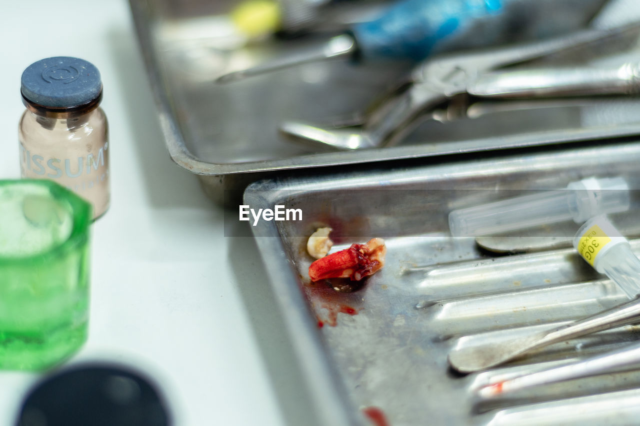 HIGH ANGLE VIEW OF MEAT IN GLASS CONTAINER