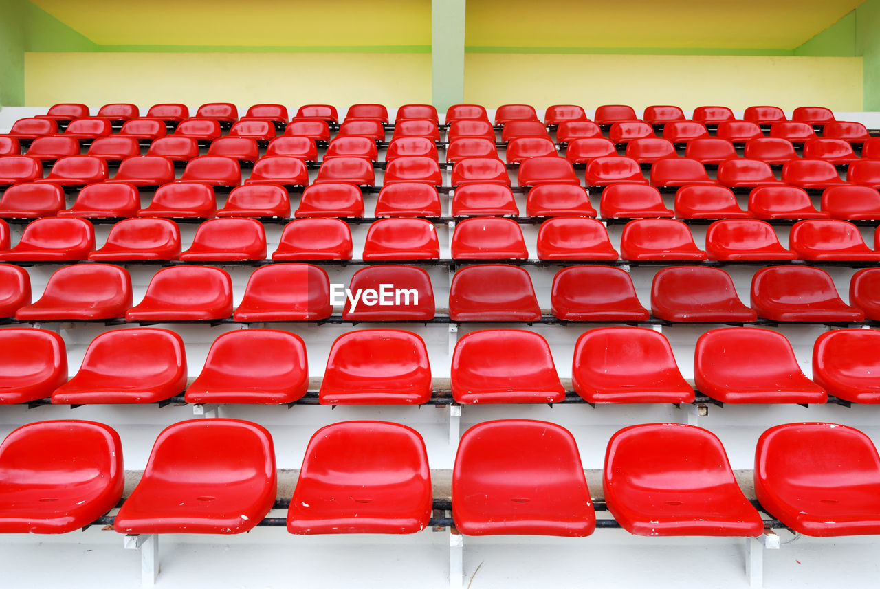 Red bleachers in sport stadium