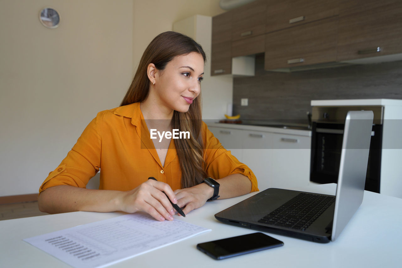 Businesswoman working at office