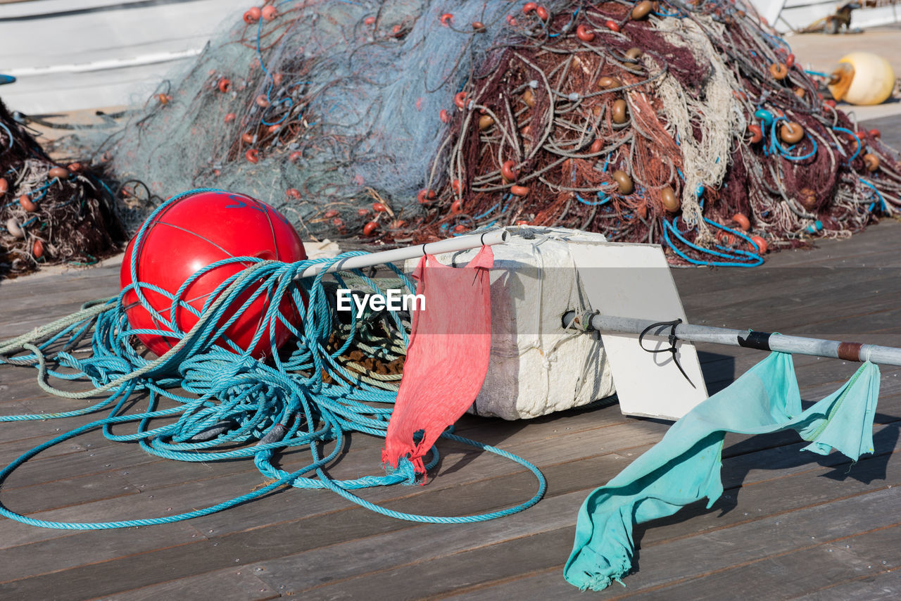 Ropes with buoy on sunny day