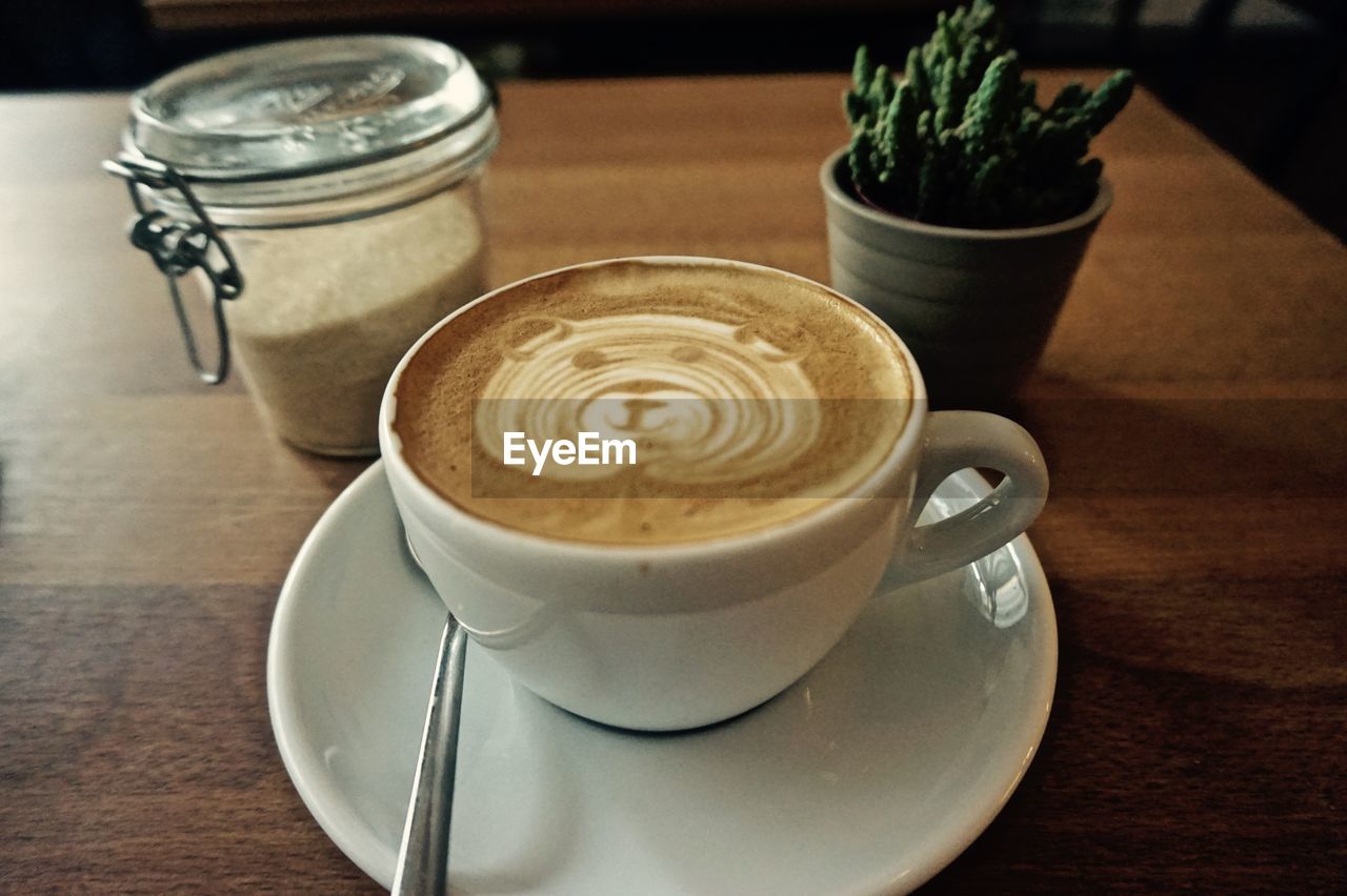 Close-up of coffee cup on table