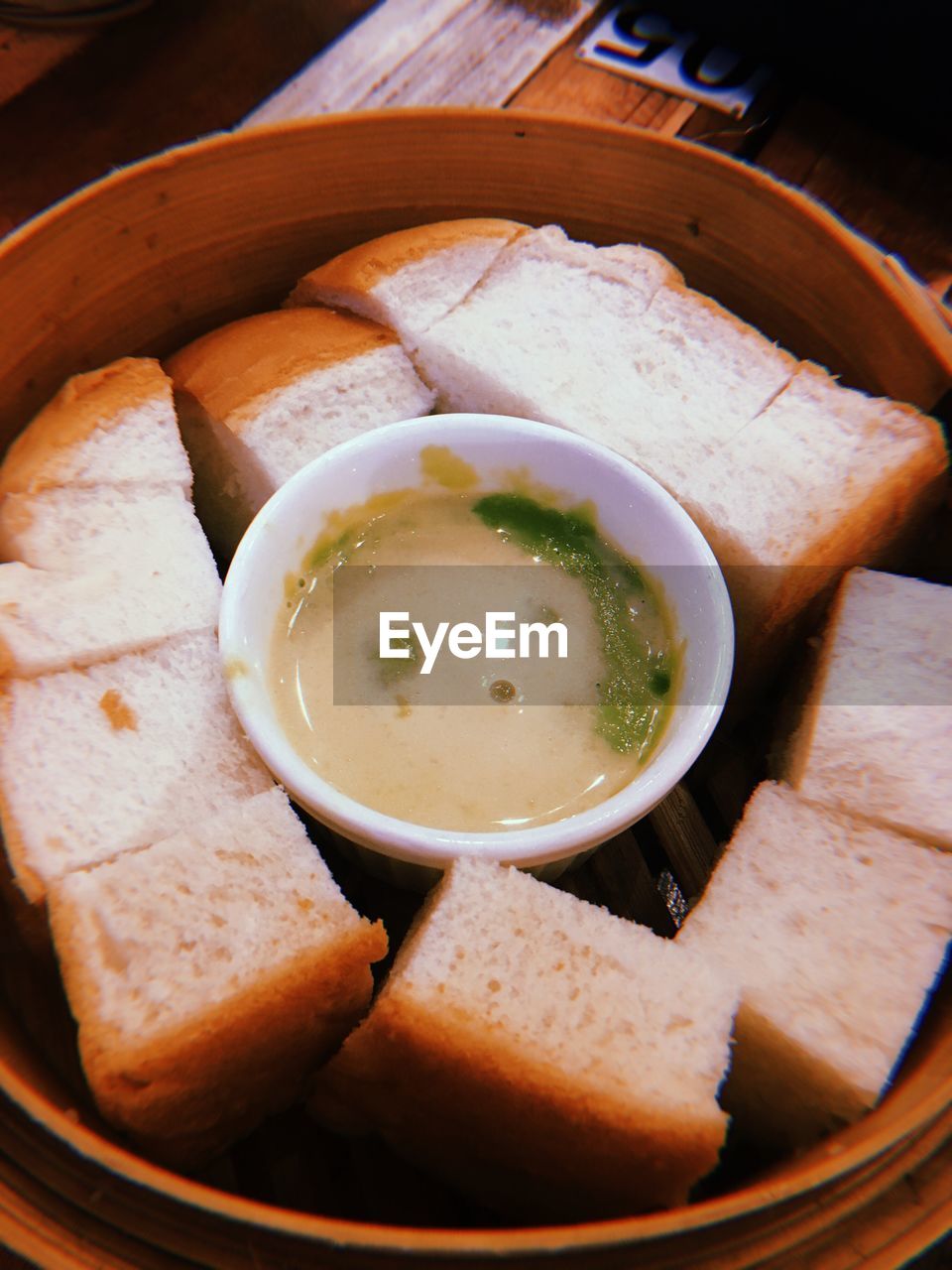 CLOSE-UP OF SOUP IN BOWL ON TABLE
