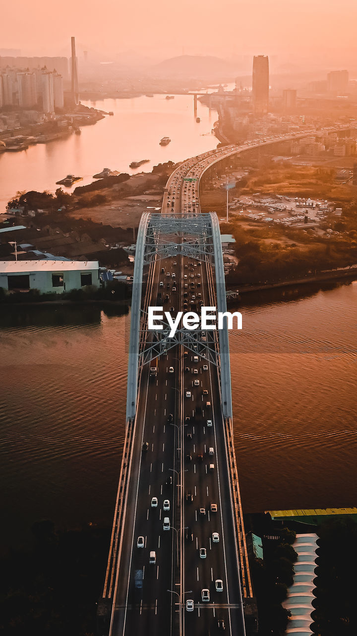 High angle view of bridge over river at sunset in guangzhou