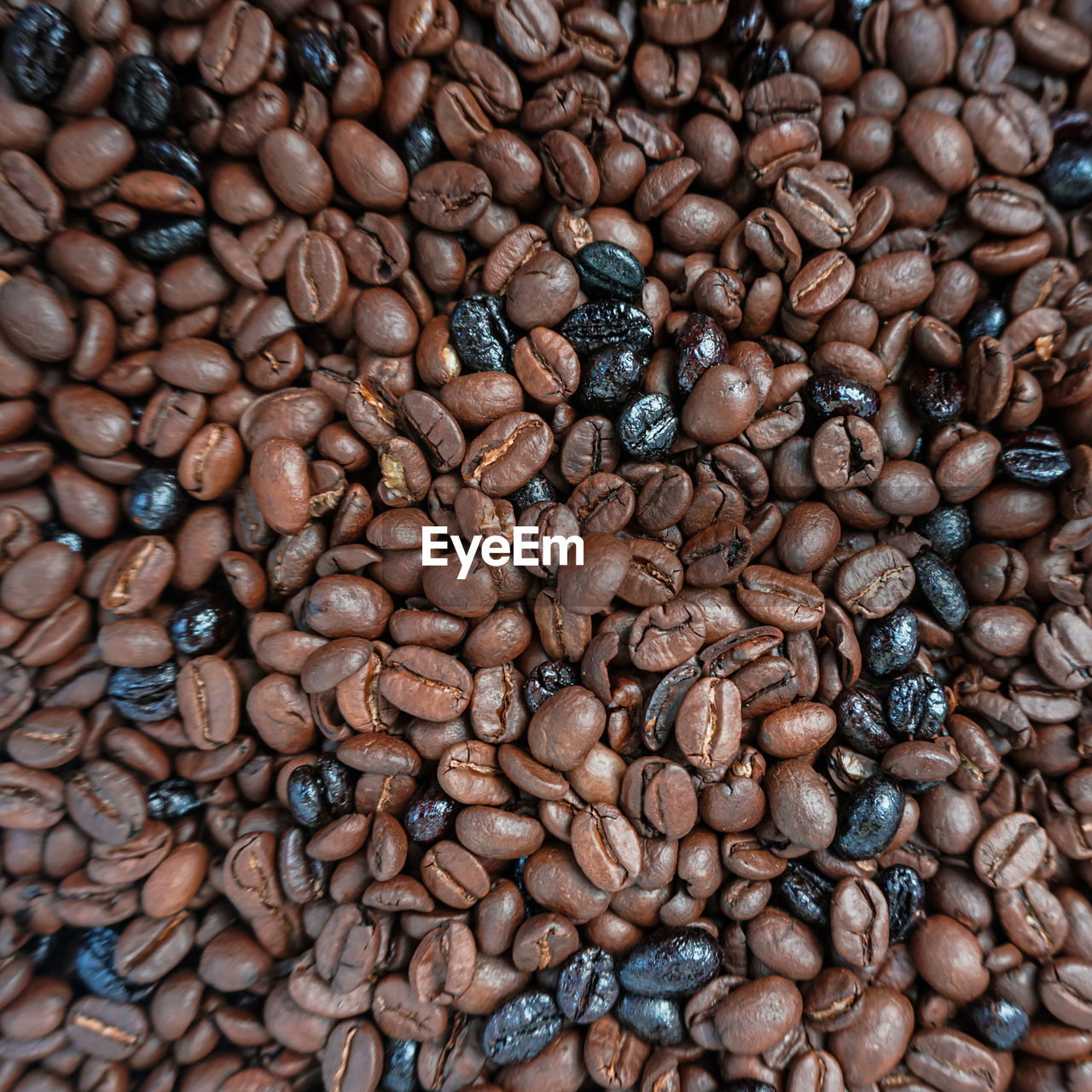 full frame shot of roasted coffee beans on table