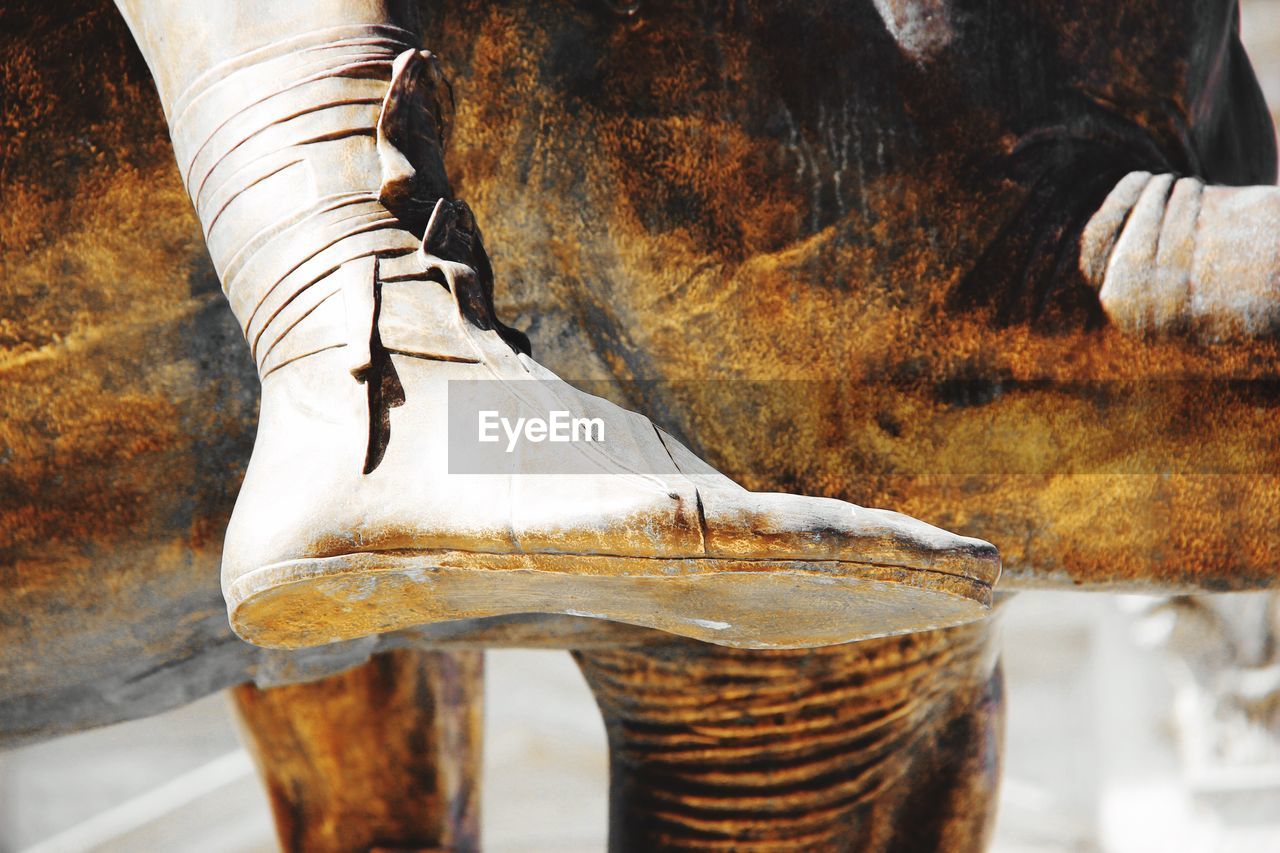 Cropped image of equestrian statue on sunny day