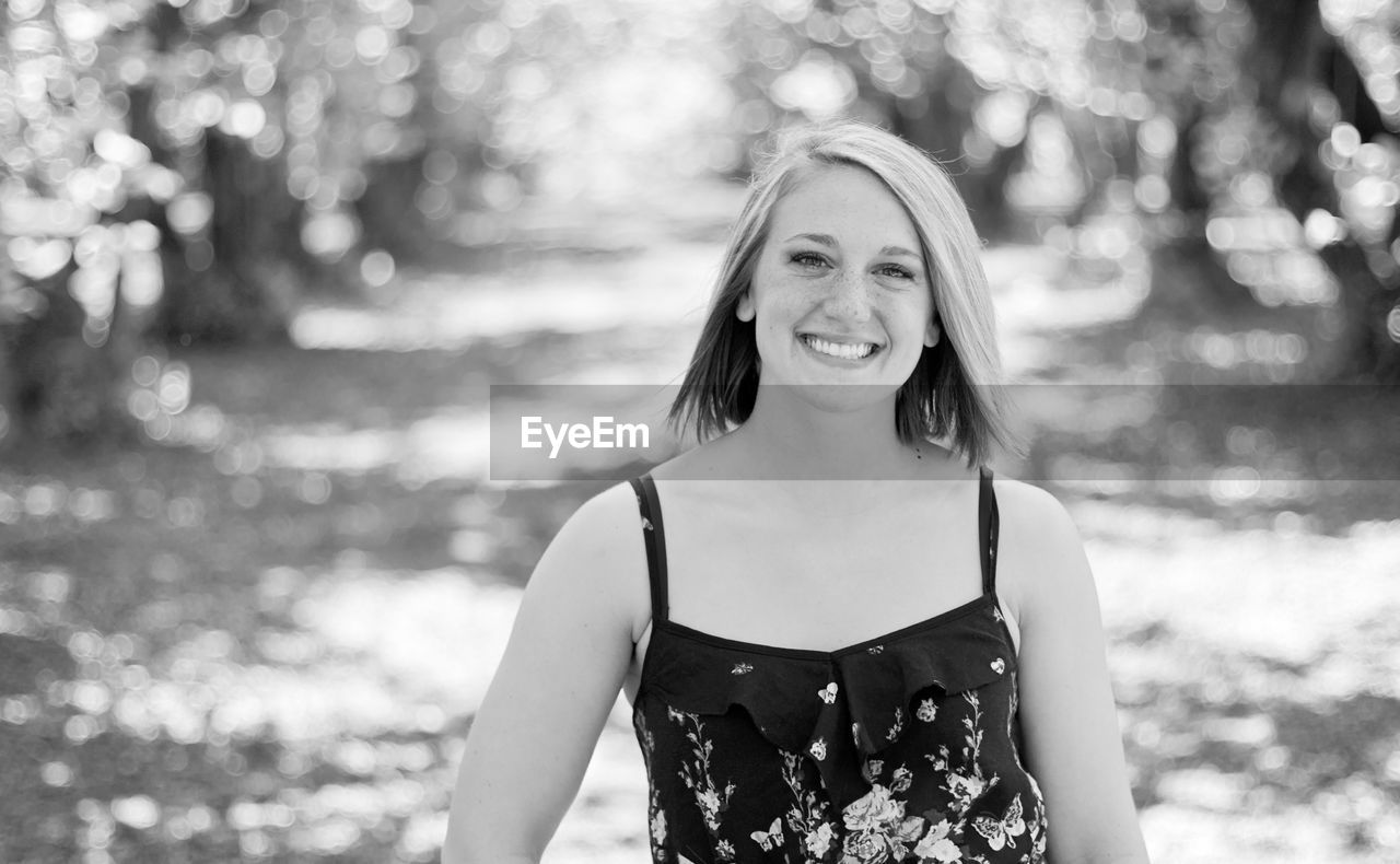 Portrait of smiling woman outdoors