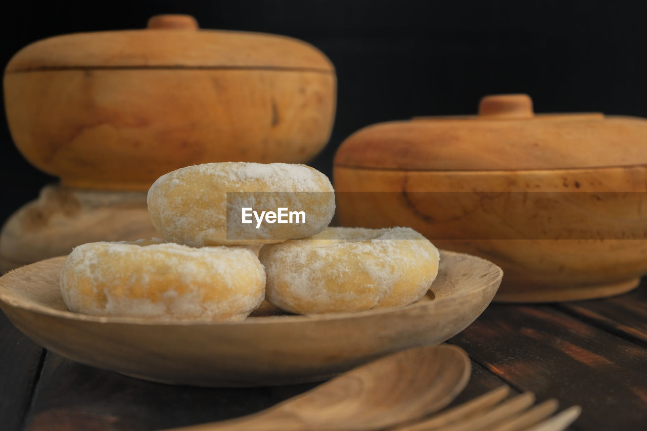 CLOSE-UP OF BREAD IN CONTAINER