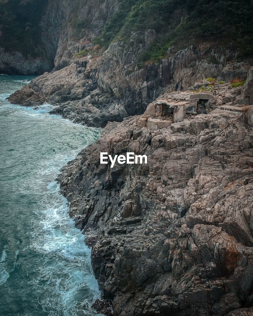 ROCK FORMATION ON WATER