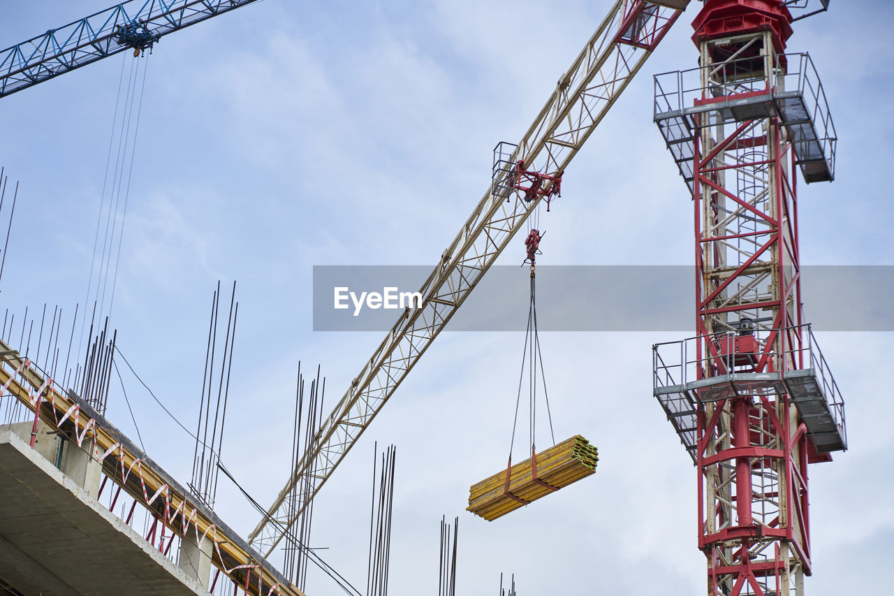 low angle view of crane at construction site