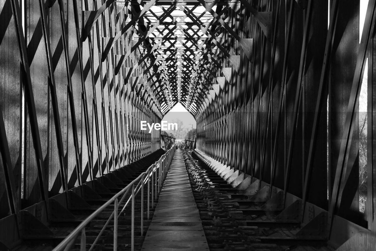 Empty railway bridge in tunnel