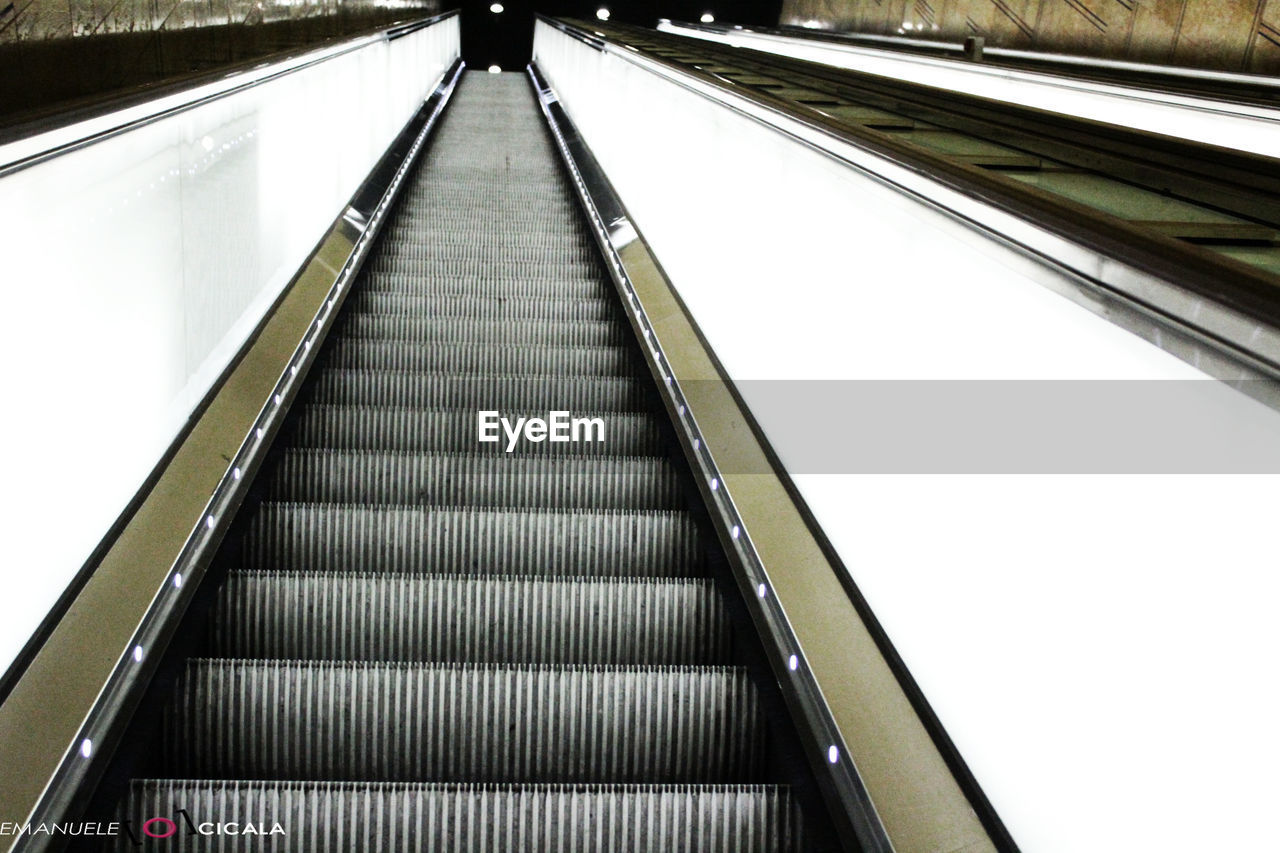 Low angle view of escalator at subway station