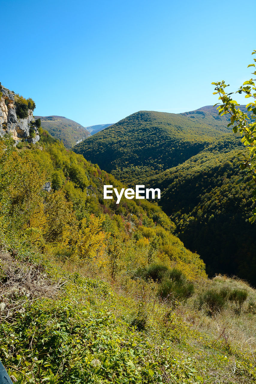 Scenic view of mountains against clear sky