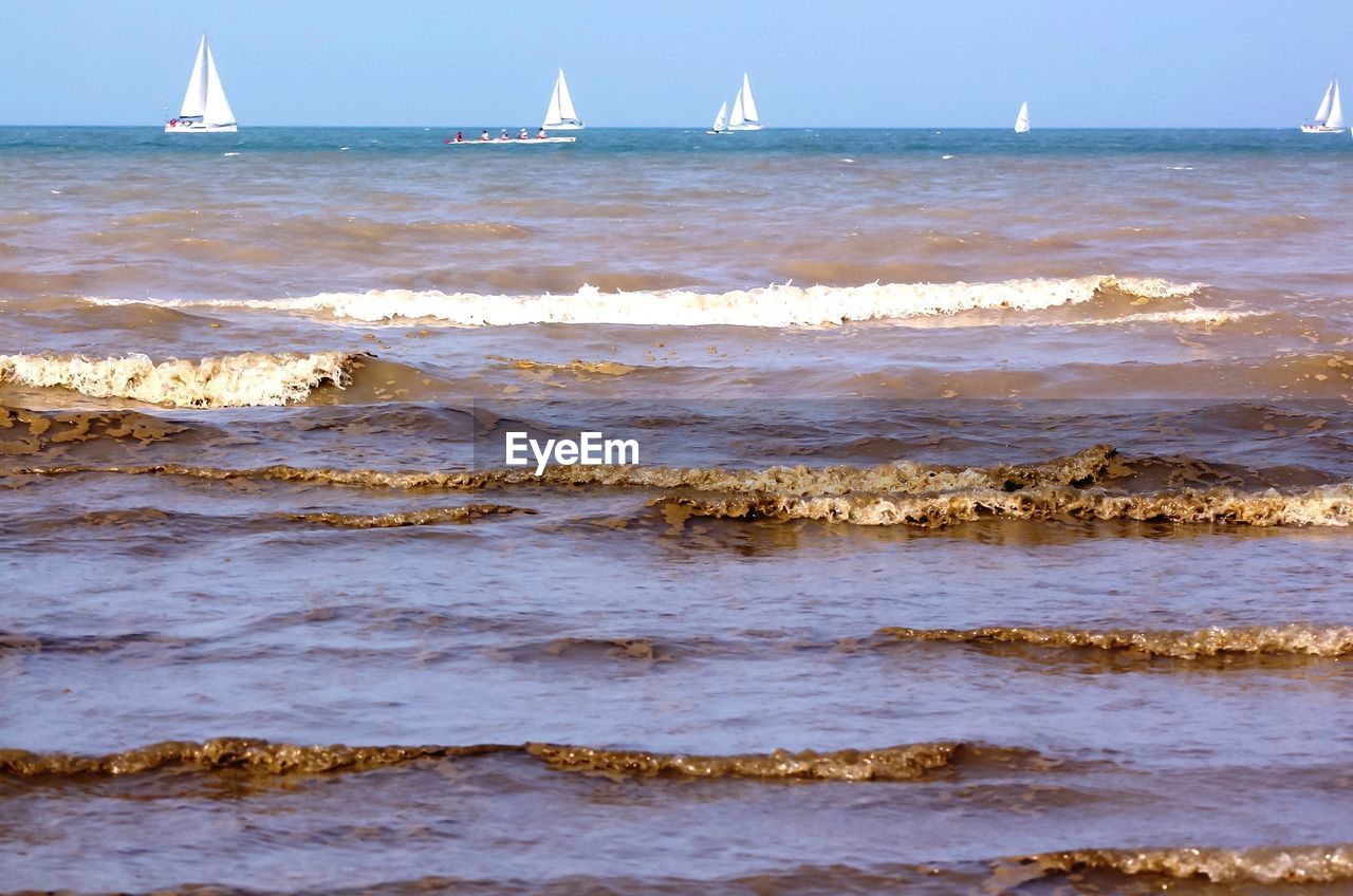 VIEW OF SAILBOAT IN CALM SEA