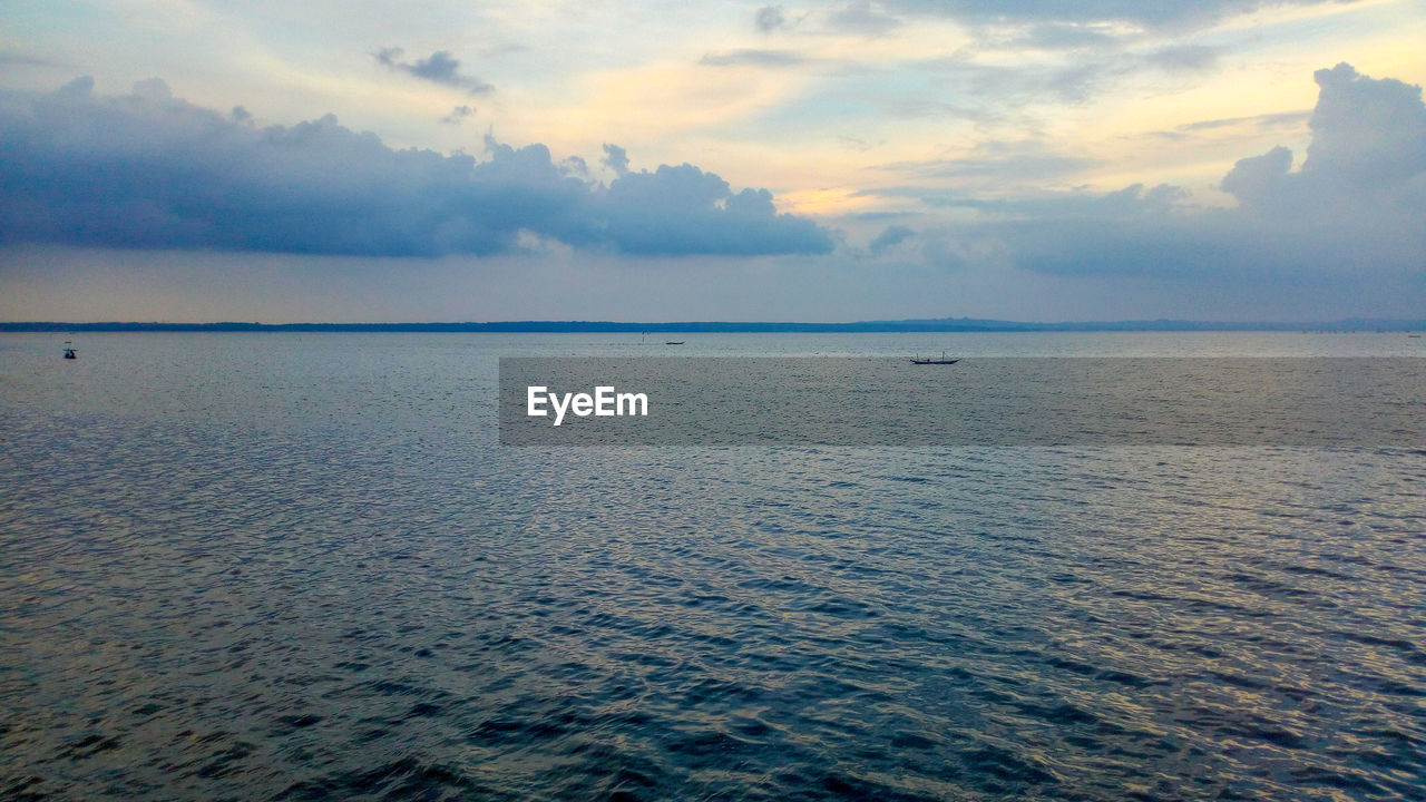 SCENIC VIEW OF SEA DURING SUNSET