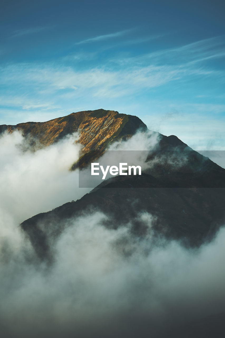 Scenic view of mountain against sky