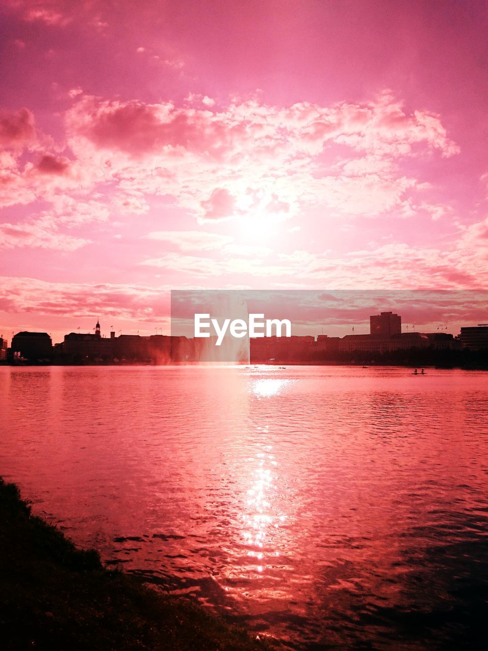 SCENIC VIEW OF SILHOUETTE RIVER AGAINST SKY DURING SUNSET