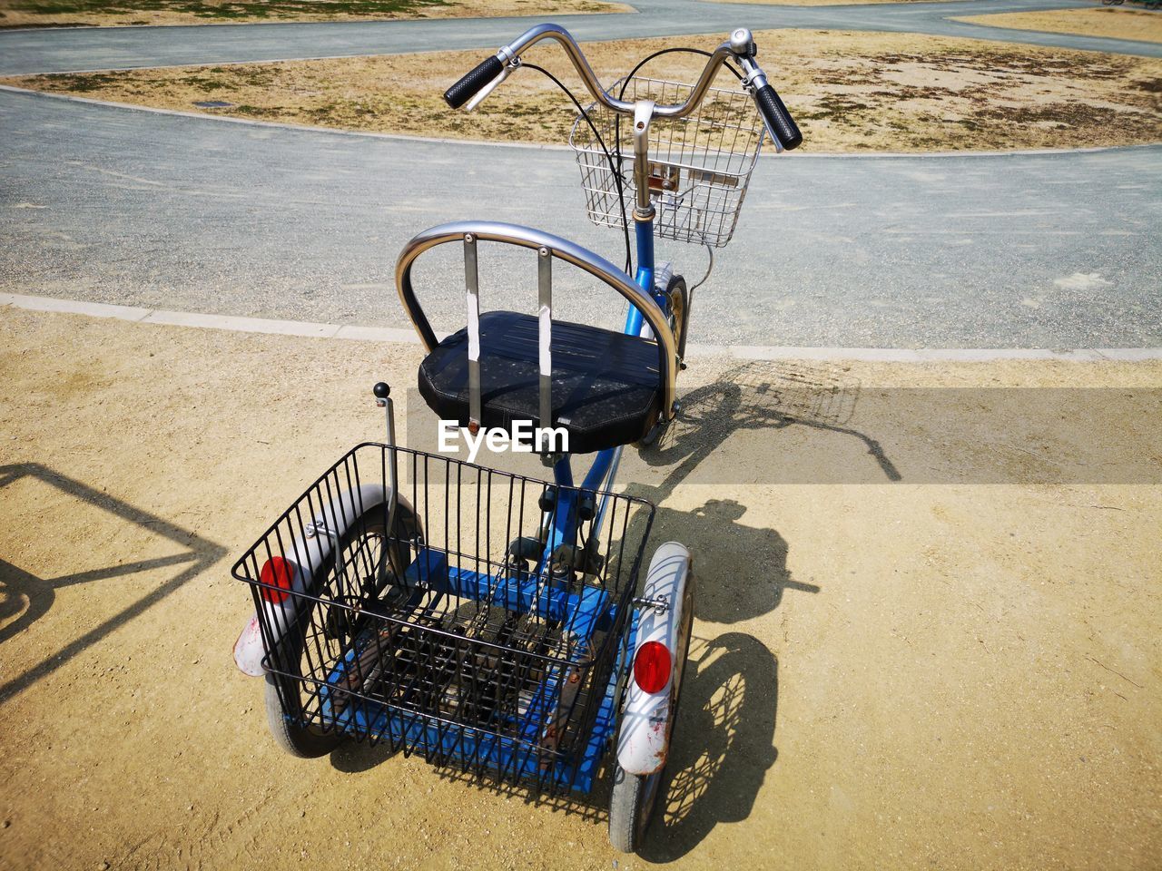 transportation, shopping cart, vehicle, day, sunlight, no people, nature, shadow, absence, mode of transportation, road, bicycle, outdoors, land, cart, land vehicle, beach