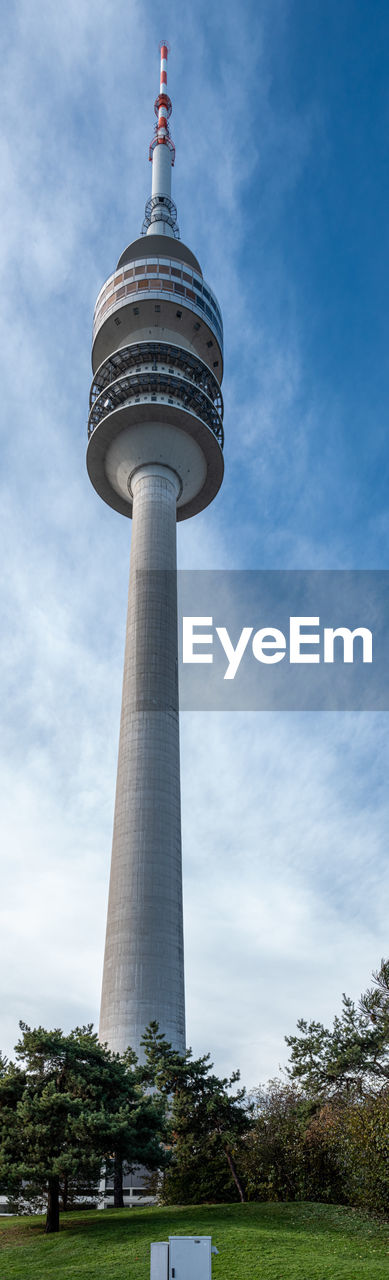 LOW ANGLE VIEW OF COMMUNICATIONS TOWER AGAINST SKY