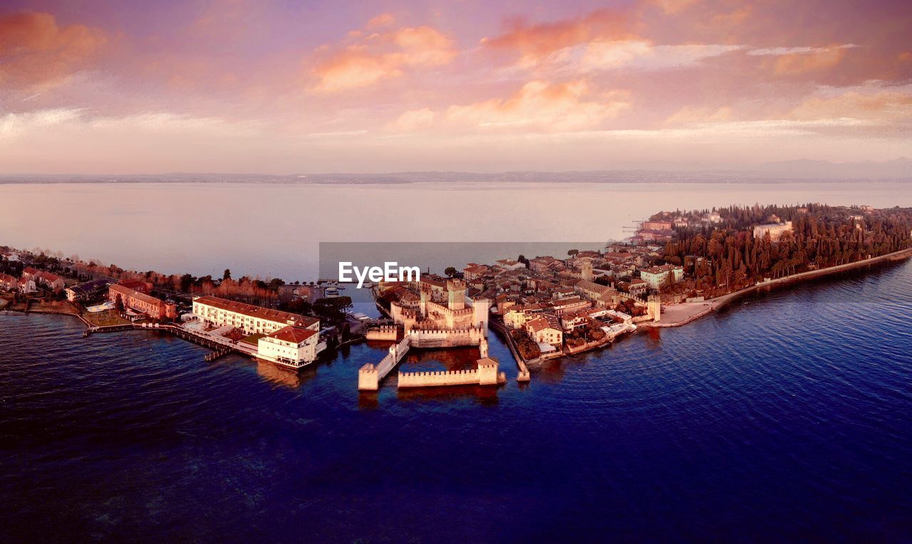 Panoramic view of sea against sky at sunset