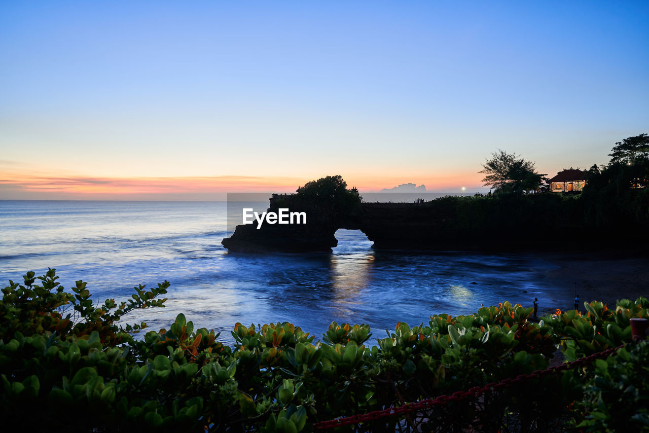 SCENIC VIEW OF SEA DURING SUNSET