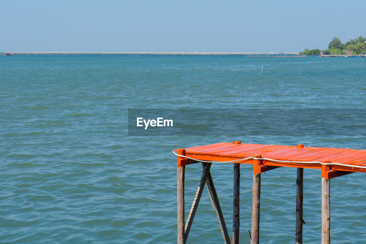 GAZEBO IN SEA AGAINST CLEAR SKY